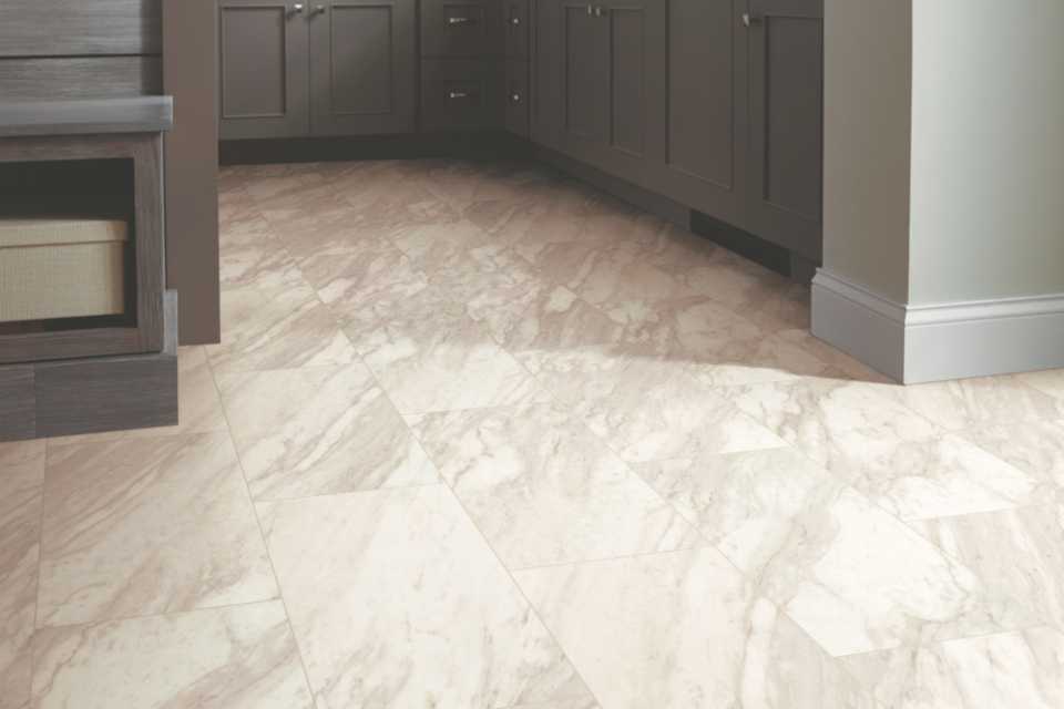 A close-up of  wood floors kitchen